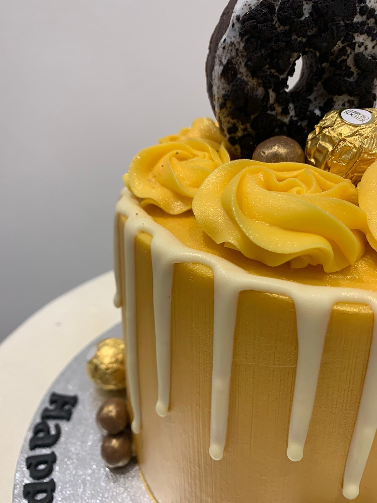 GOLD DONUT DRIP CAKE