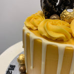 GOLD DONUT DRIP CAKE