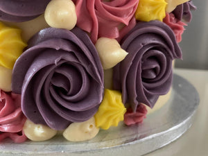 MULTI-COLOURED ROSETTE CAKE