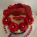 RED STRIPE AND ROSE CAKE