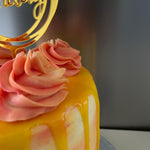 SUNSHINE AND ROSE DRIP CAKE
