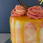 SUNSHINE AND ROSE DRIP CAKE