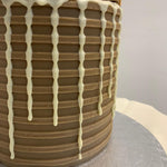 BUENO WHITE DRIP CAKE