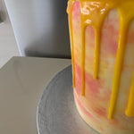 SUNSHINE AND ROSE DRIP CAKE